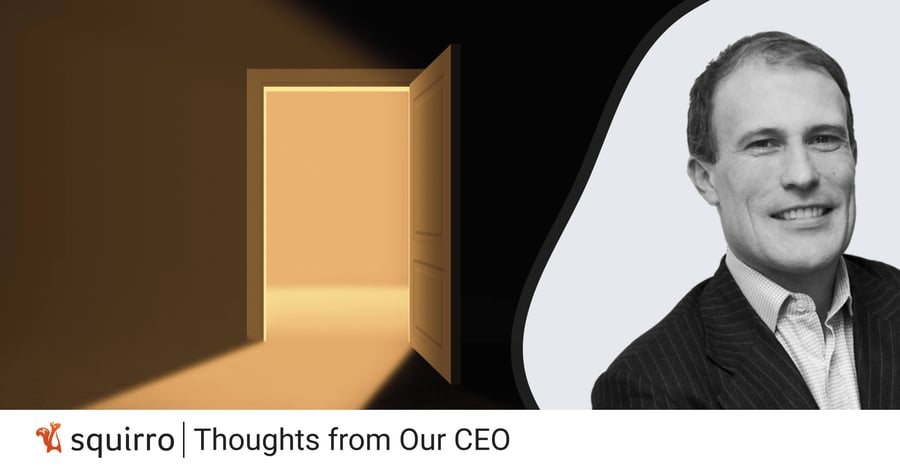 Image of Squirro CEO Dorian in front of an open door with light shining though