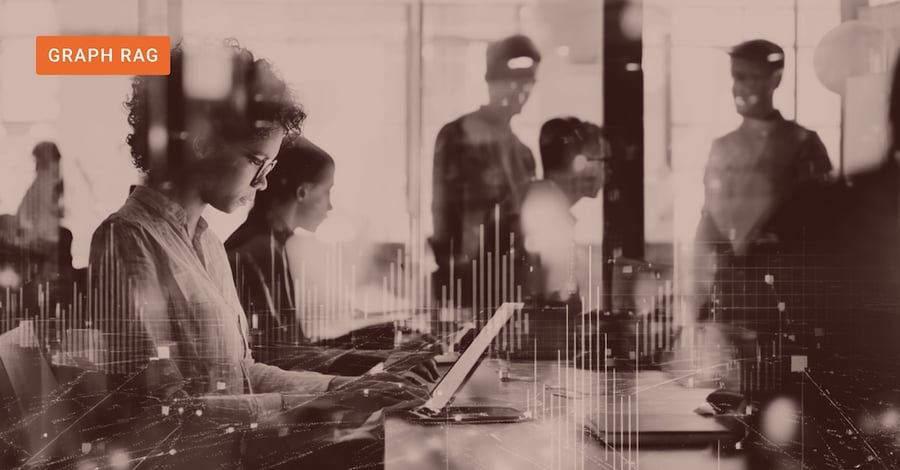 A woman using a laptop in a busy office with the word 