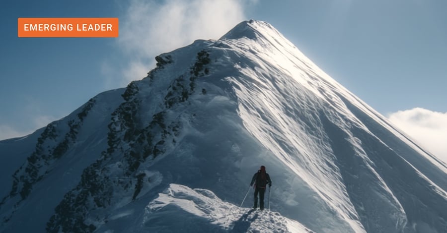 A mountaineer approaching the summit of a mountain, symbolizing Squirro's leadership in the GenAI landscape. 